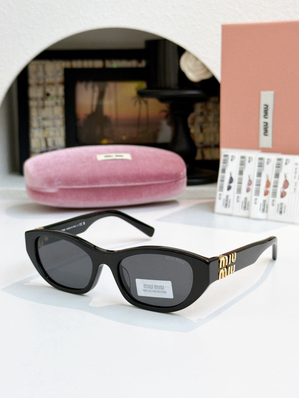 Sunglasses miumiu