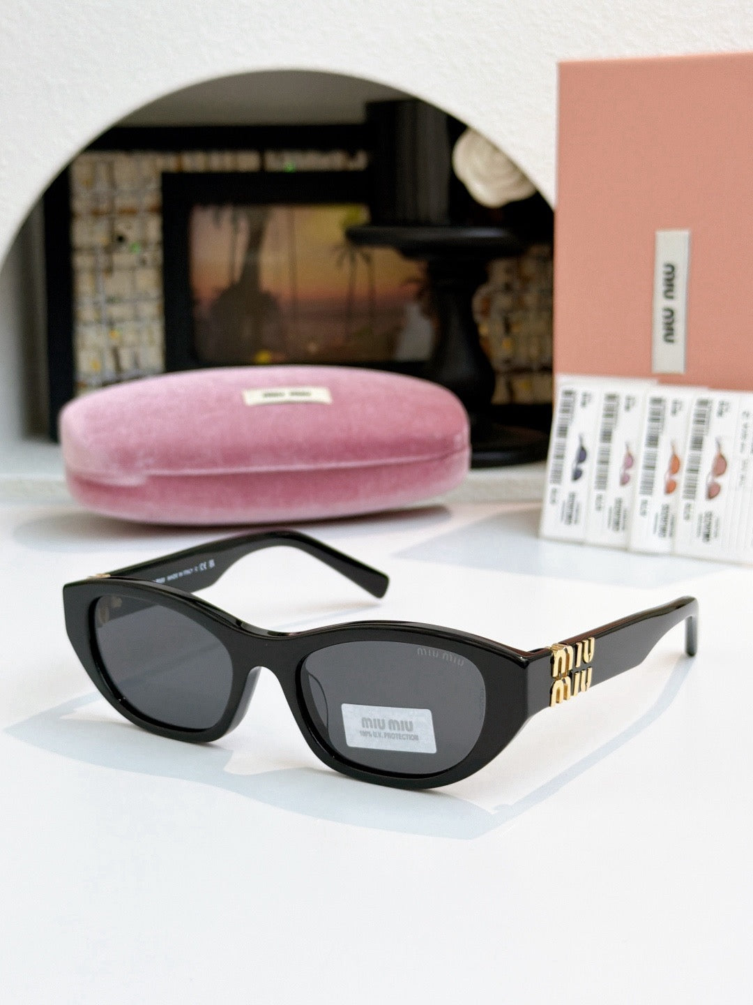 Sunglasses miumiu