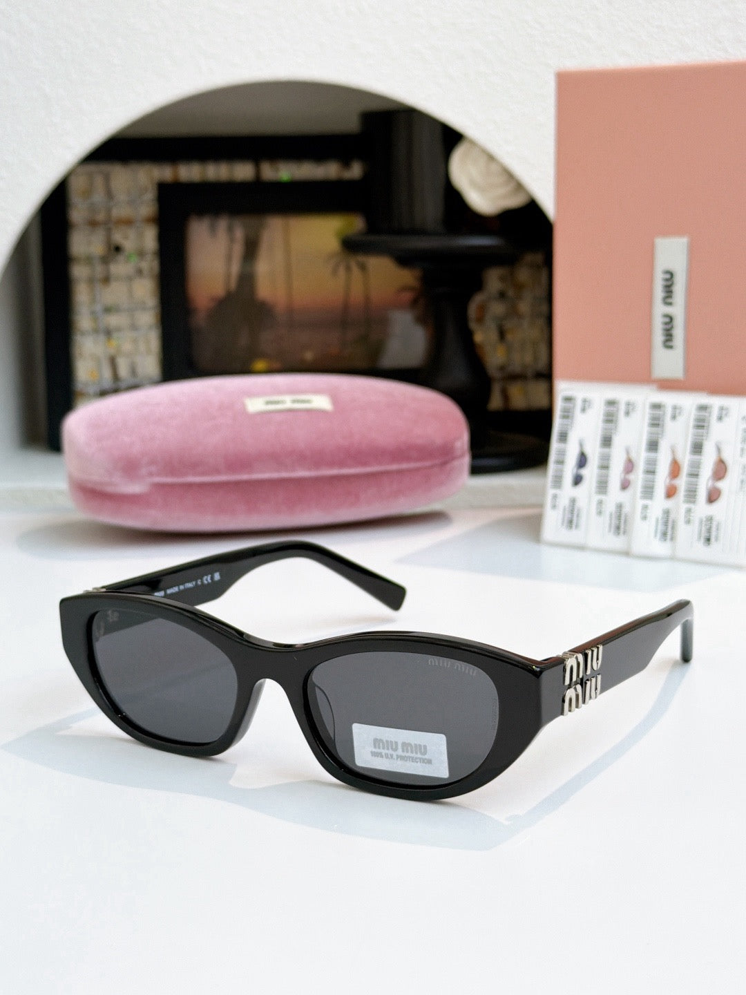 Sunglasses miumiu