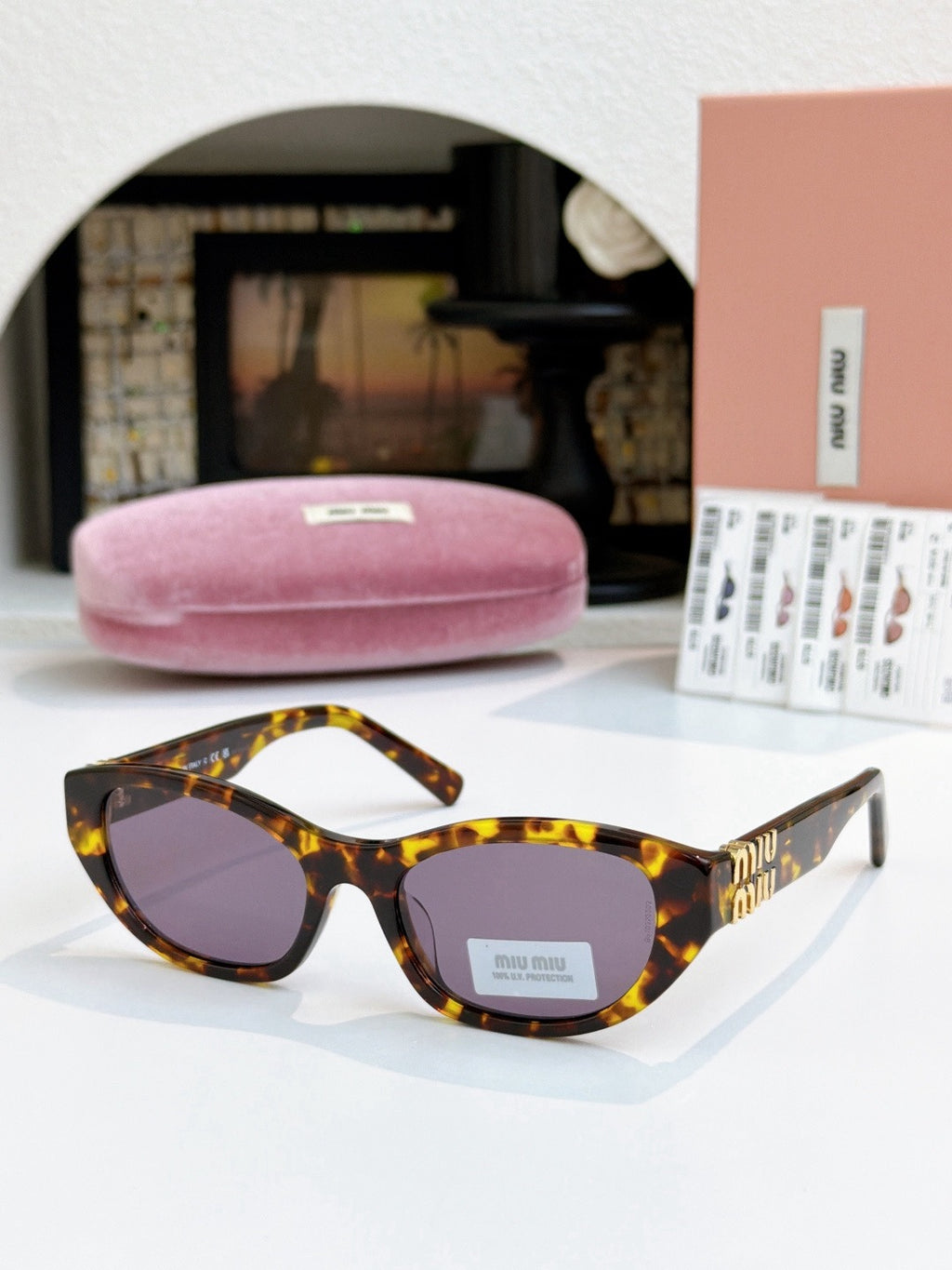 Sunglasses miumiu
