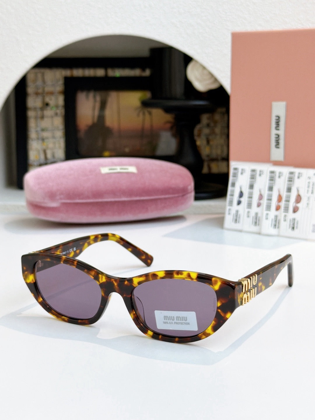 Sunglasses miumiu