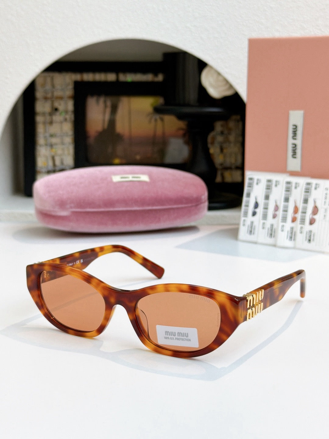 Sunglasses miumiu