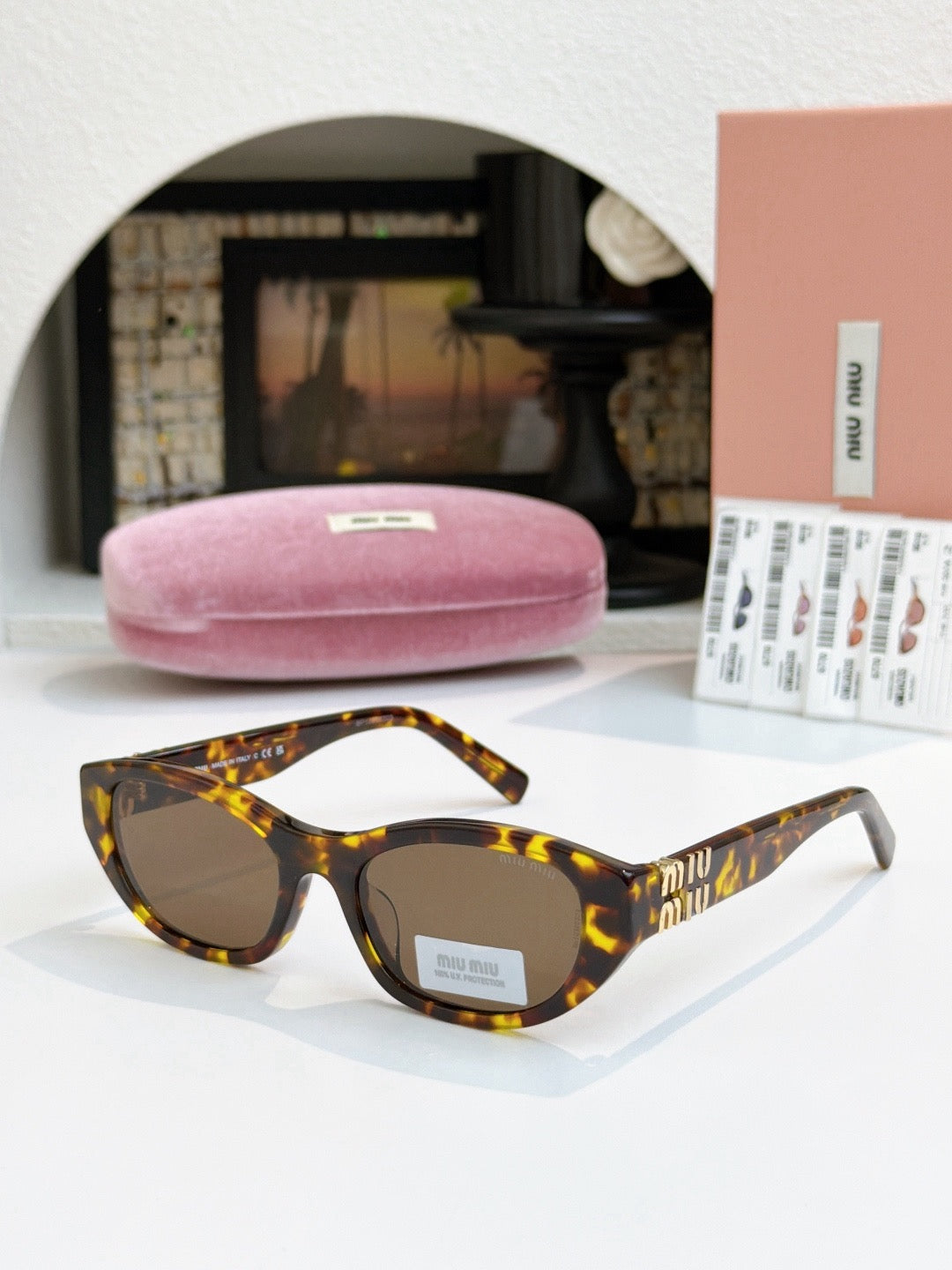 Sunglasses miumiu