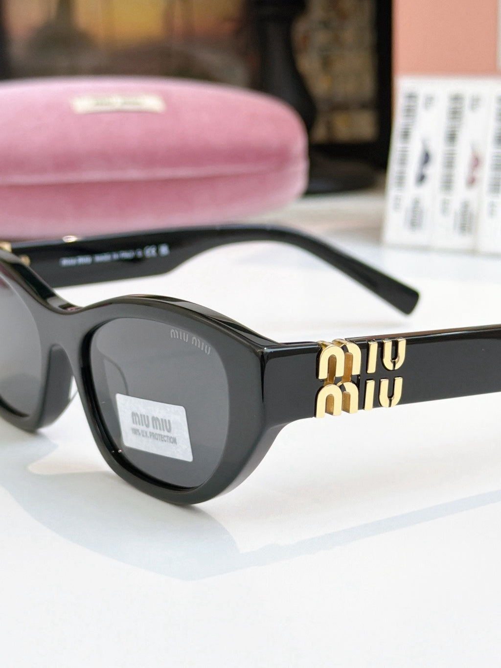 Sunglasses miumiu