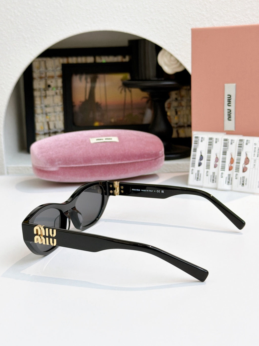 Sunglasses miumiu