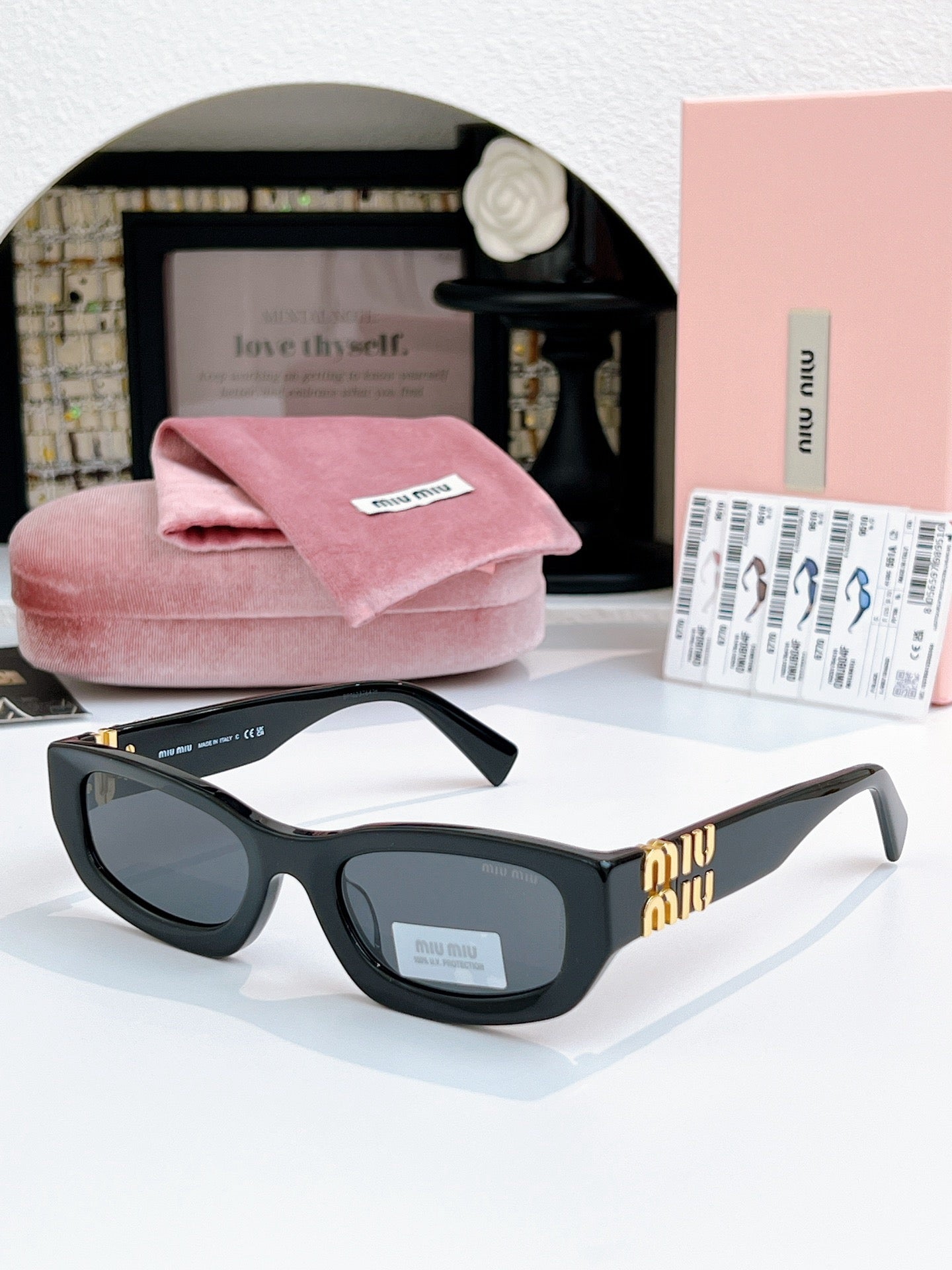 Sunglasses miumiu