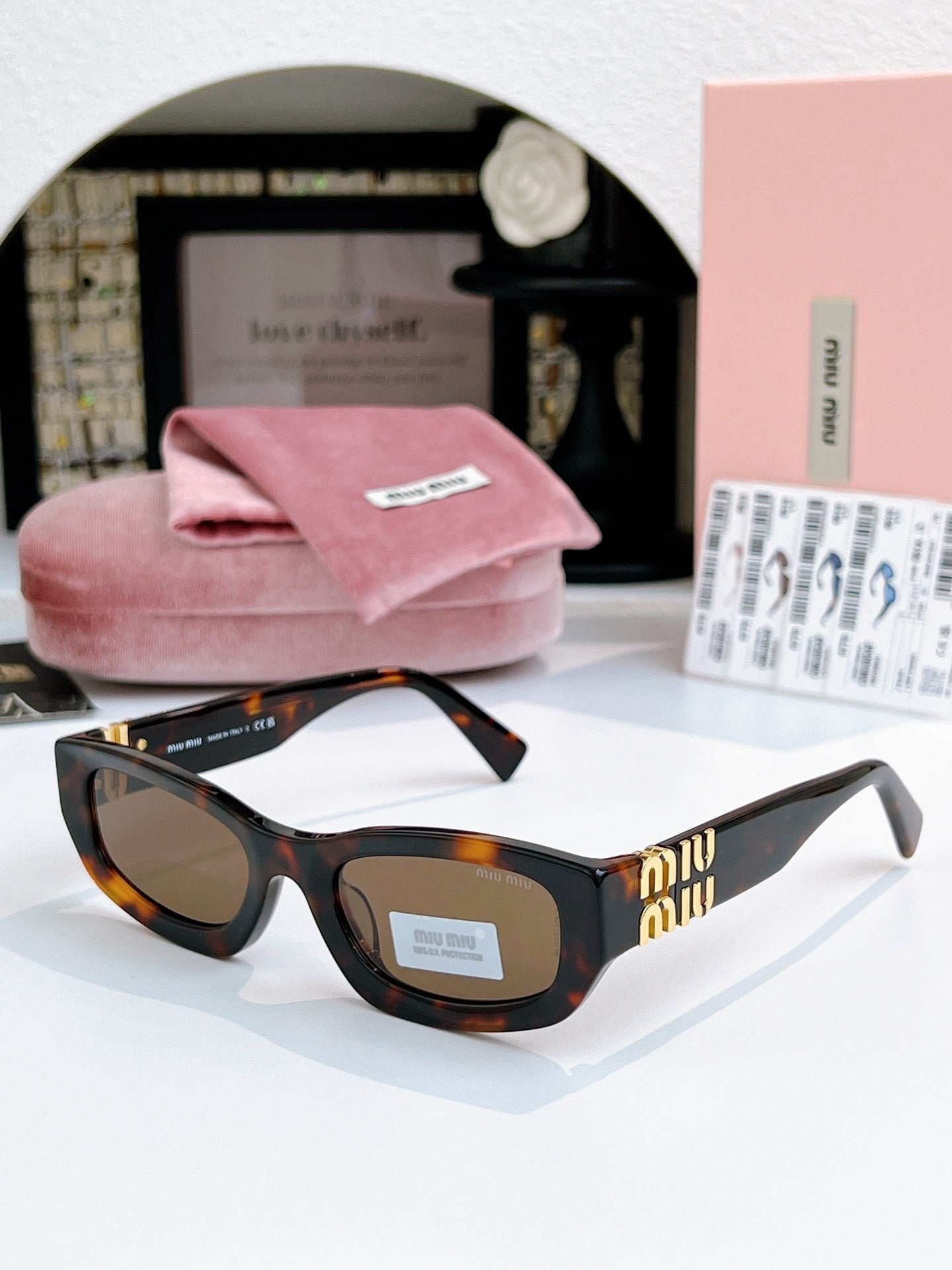 Sunglasses miumiu