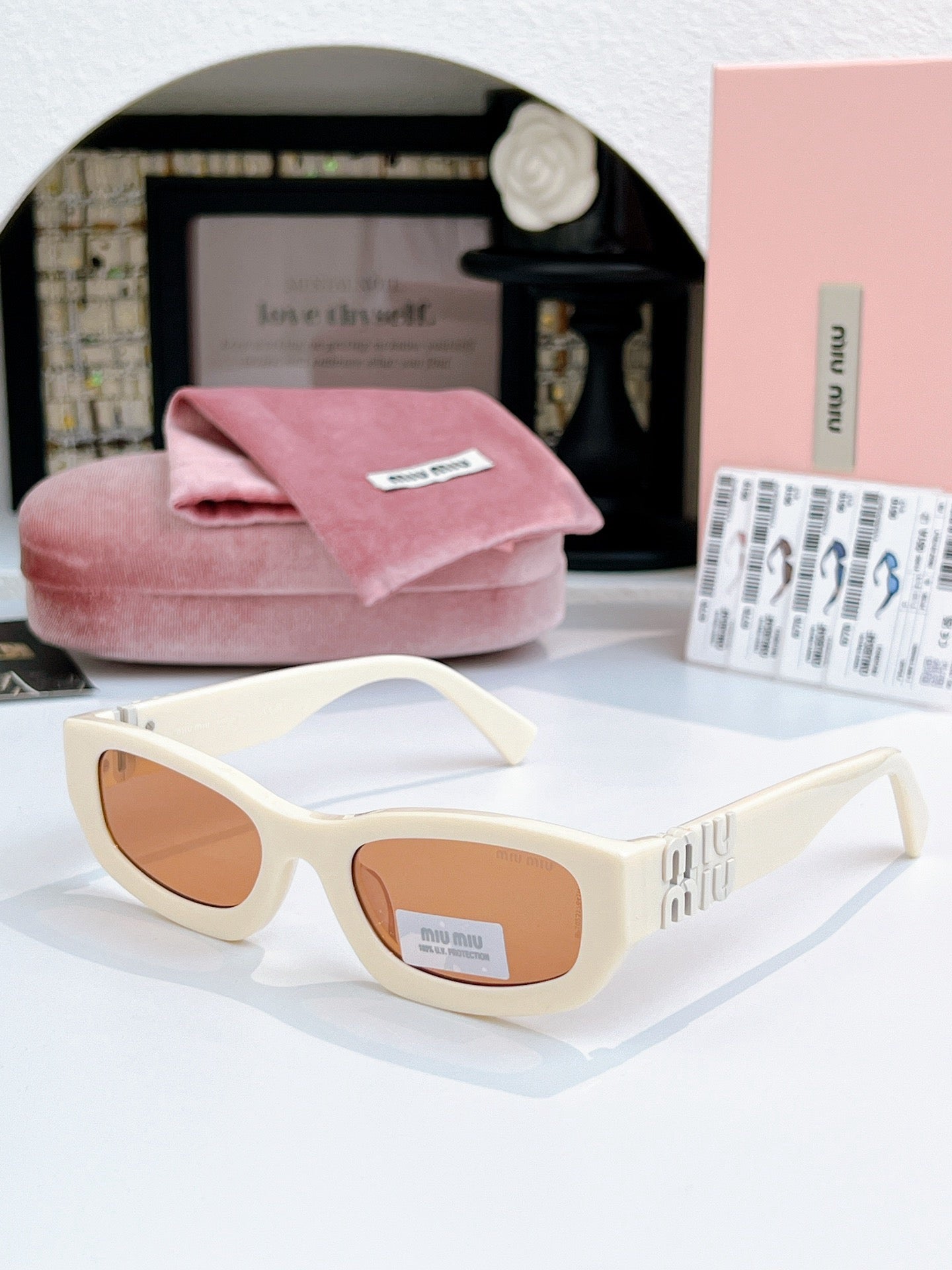 Sunglasses miumiu