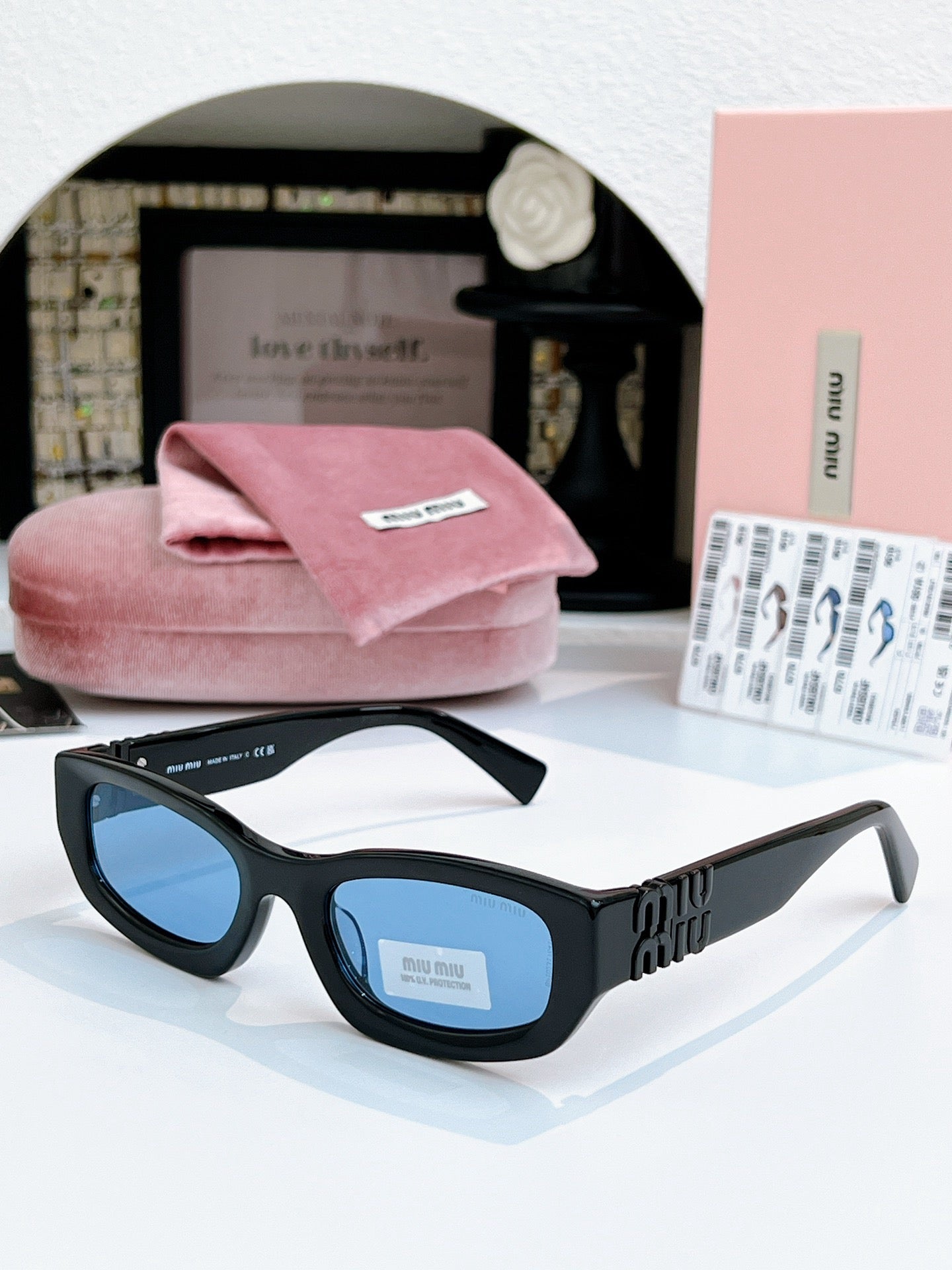 Sunglasses miumiu