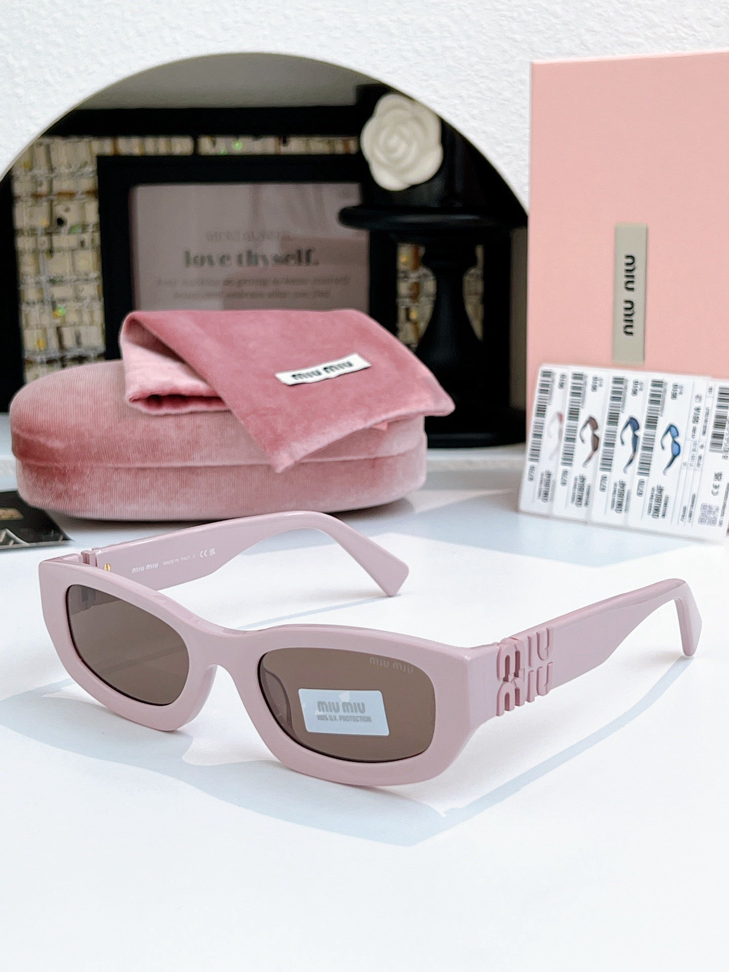 Sunglasses miumiu