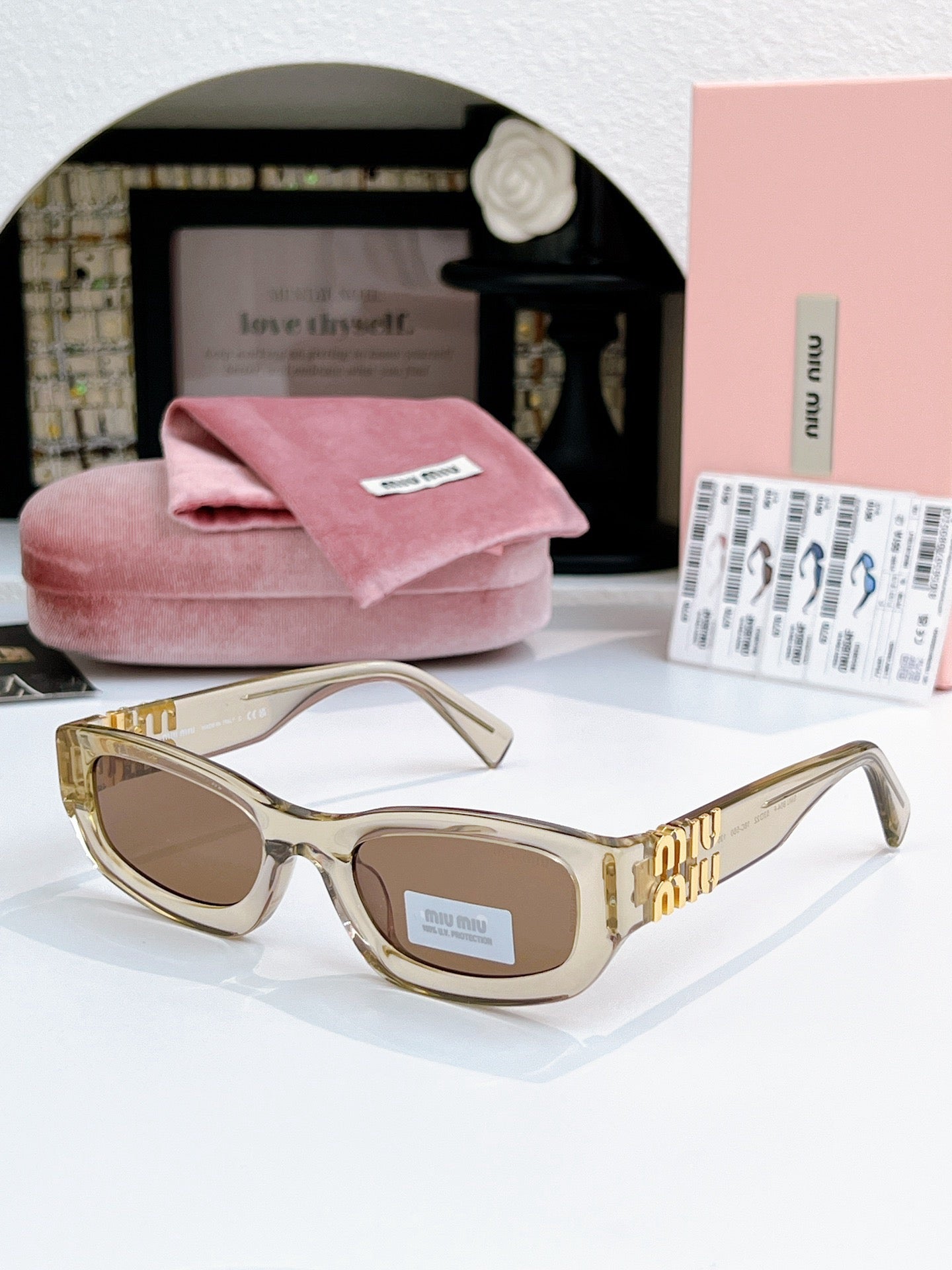 Sunglasses miumiu