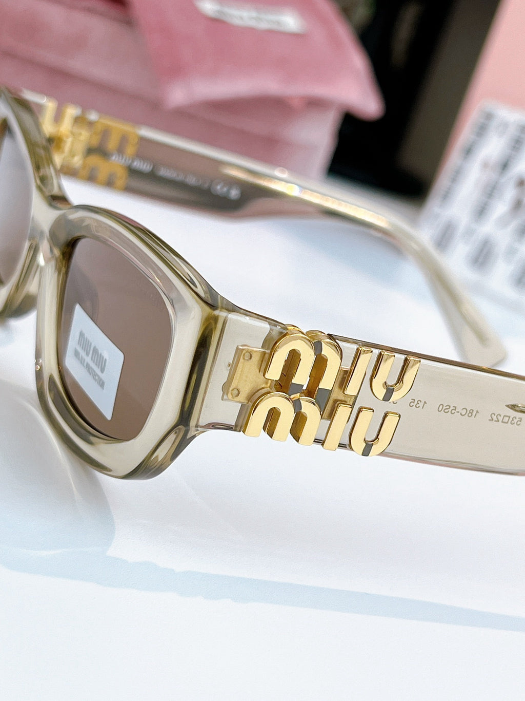 Sunglasses miumiu