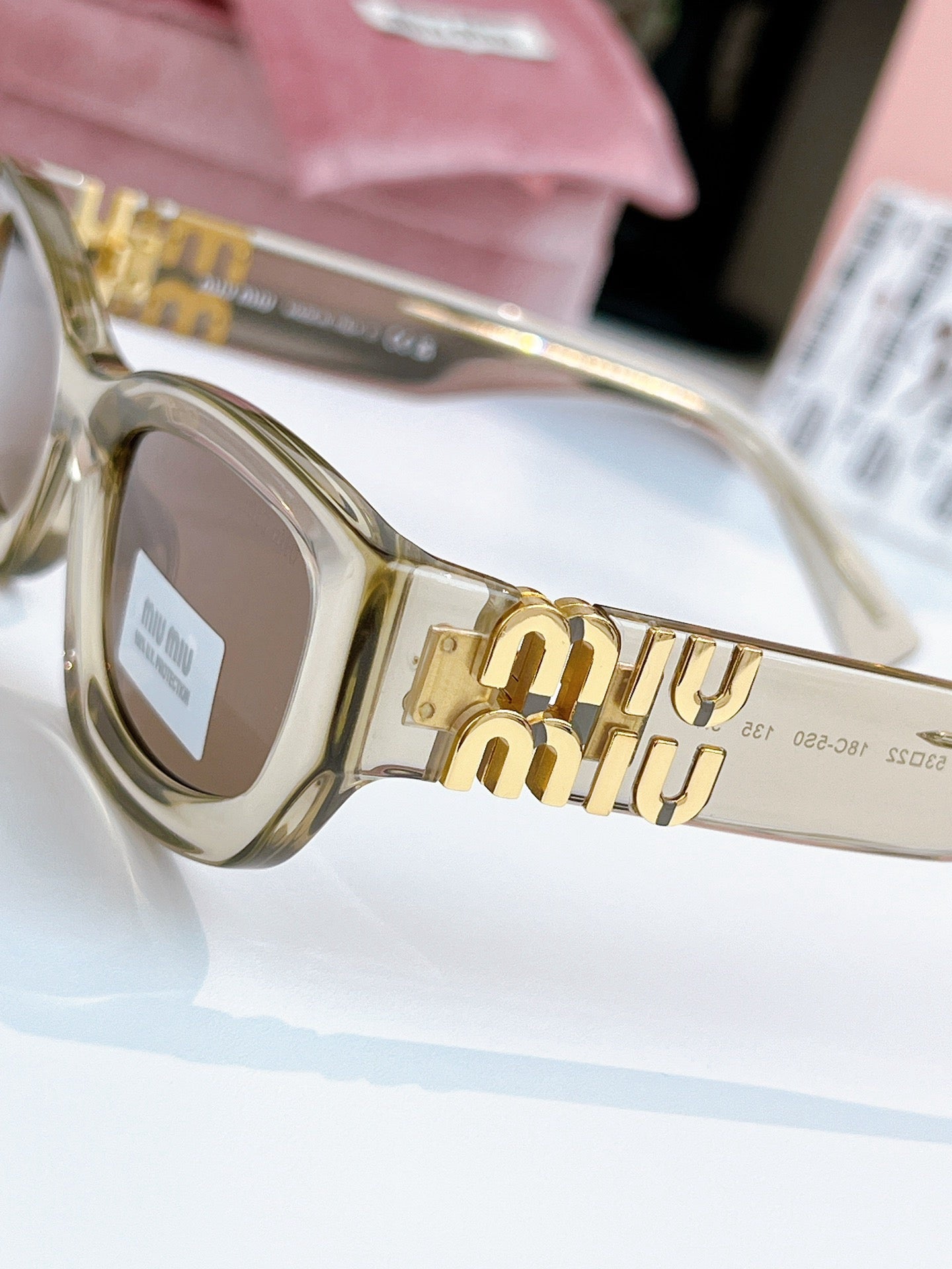 Sunglasses miumiu