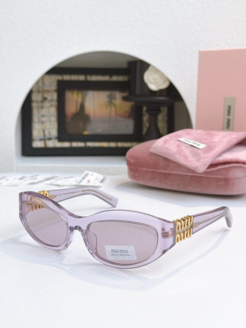 Sunglasses miumiu