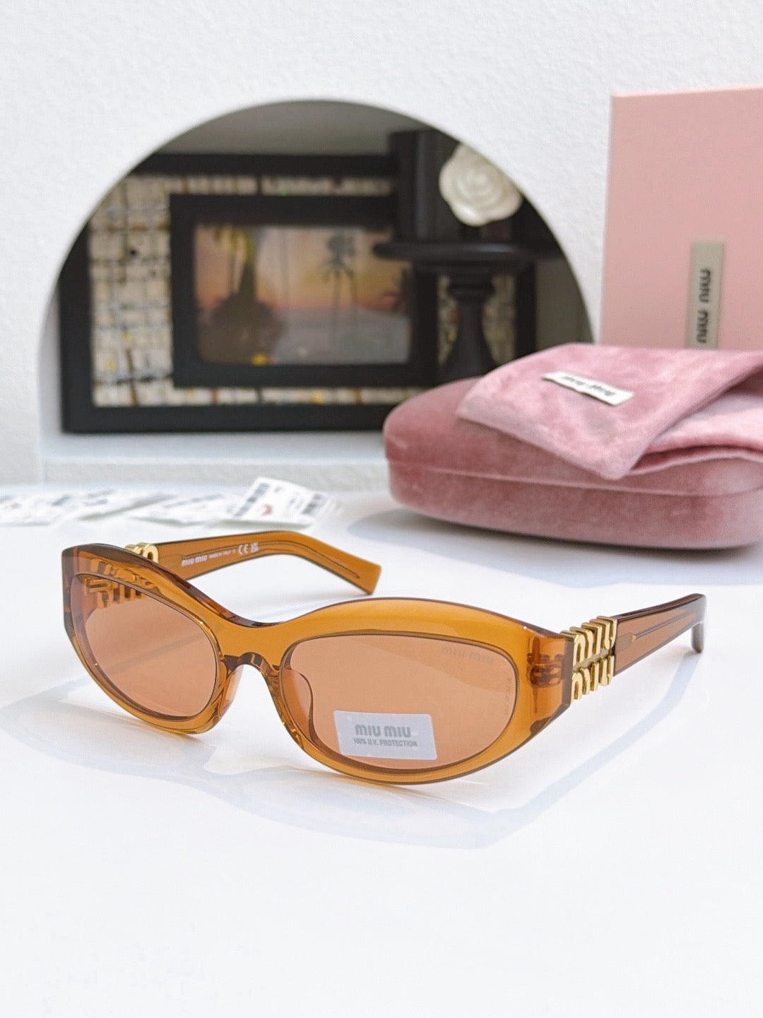 Sunglasses miumiu