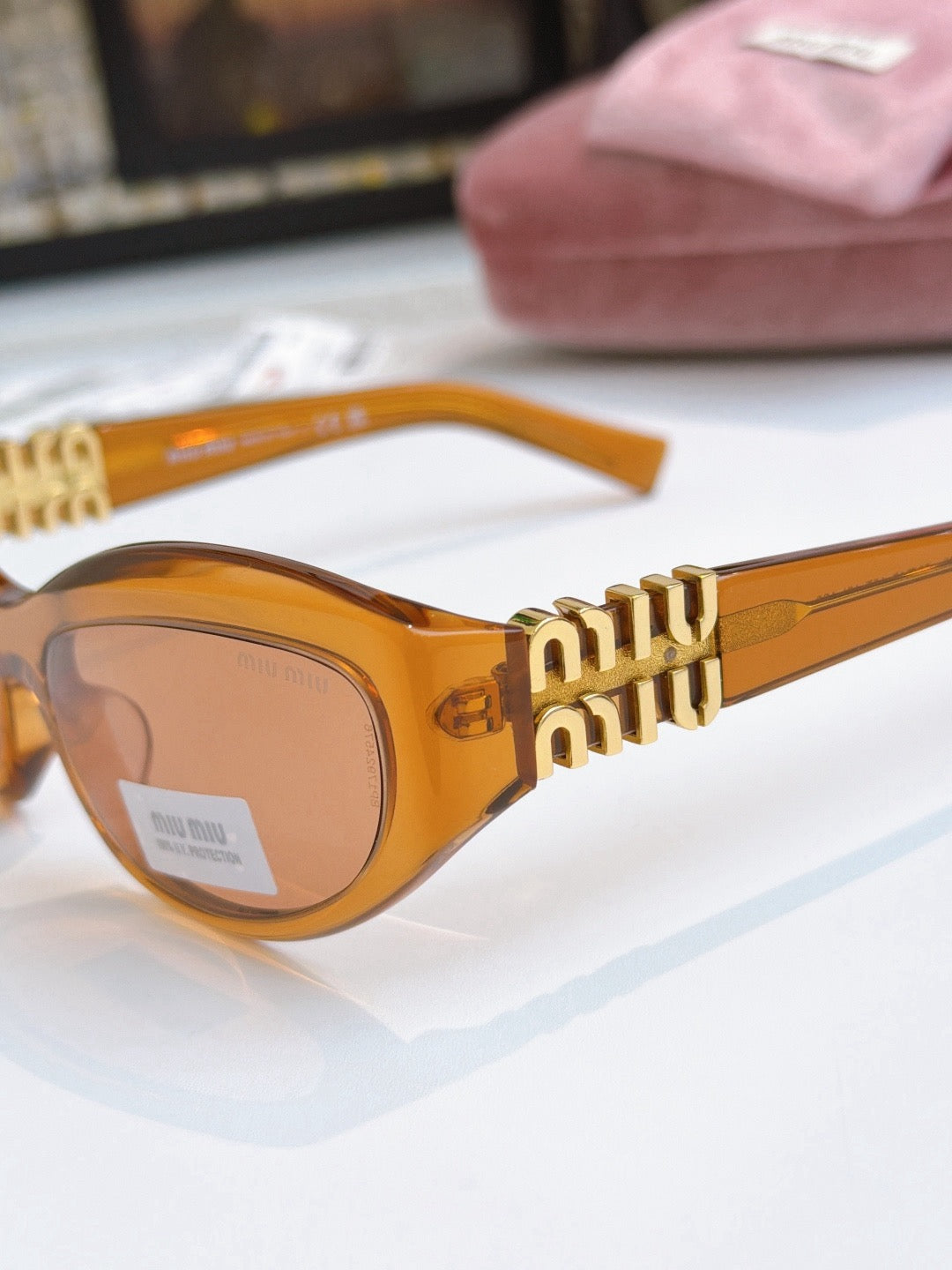 Sunglasses miumiu