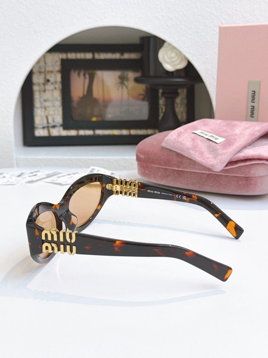 Sunglasses miumiu