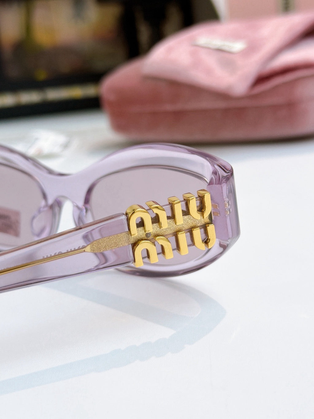 Sunglasses miumiu